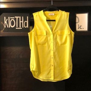 Calvin Klein S yellow sleeveless shirt.